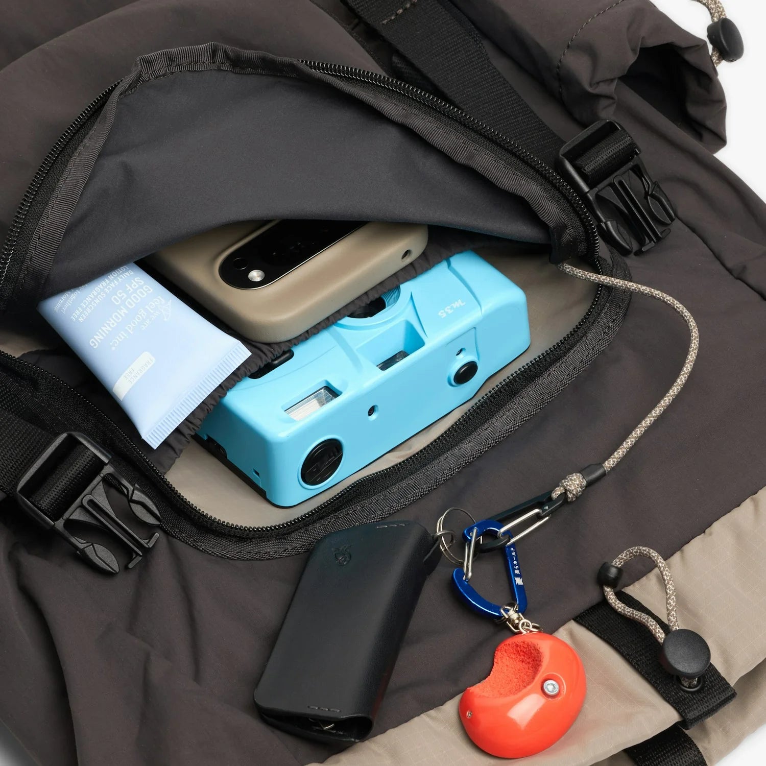 Foldover Drawstring Daypack with Buckle & Side Pocket Details